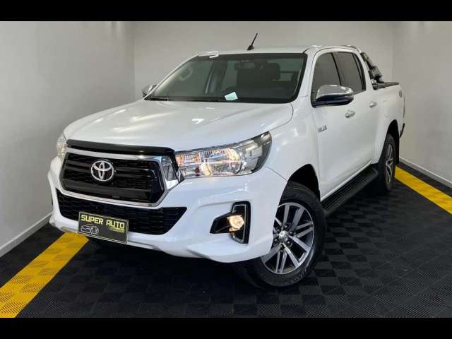 Toyota Hilux SRV 2.8T 177CV E 4X4 - Branca - 2018/2019