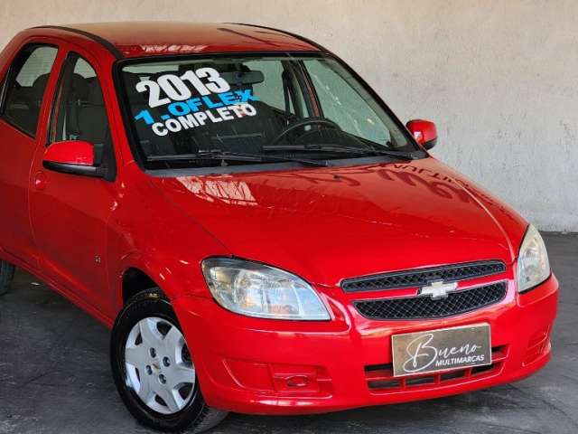 GM/ Celta LT Completo Vermelho Baixo KM Impecavel Aceito Trocas e Financio - 2013