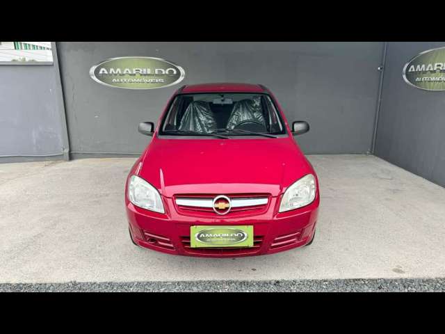 Chevrolet Prisma  Sed. Maxx/ LT 1.4 8V ECONOF. 4p  - Vermelha - 2010/2011