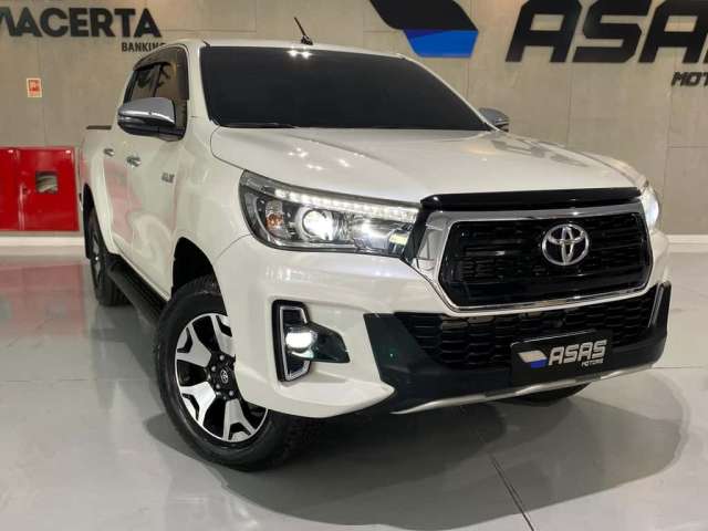 Toyota Hilux CD SRX 4X4 Diesel - Branca - 2019/2020