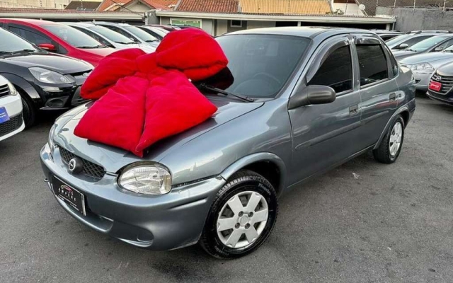 GM - Chevrolet Corsa Sedan Milenium 1.0 16v Vermelha 2001 - Campo