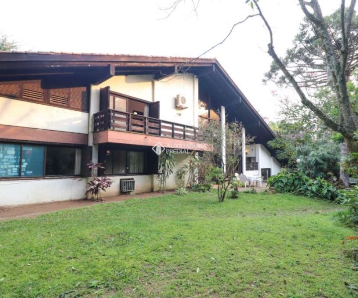 Casas com 4 quartos à venda na Rua Padre João Batista Reus em Porto Alegre