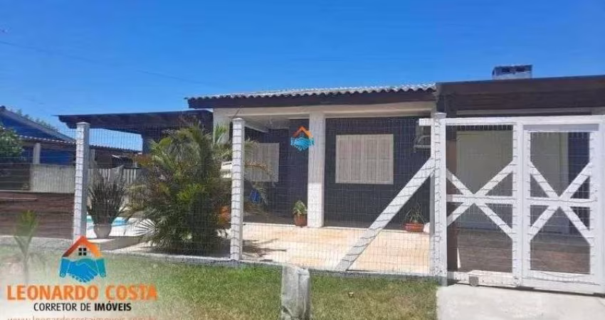 Ótima casa com piscina no centro de Balneário Pinhal