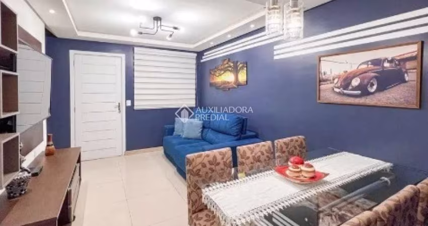 Casa em condomínio fechado com 2 quartos à venda na Rua dos Guaramirins, 303, Igara, Canoas