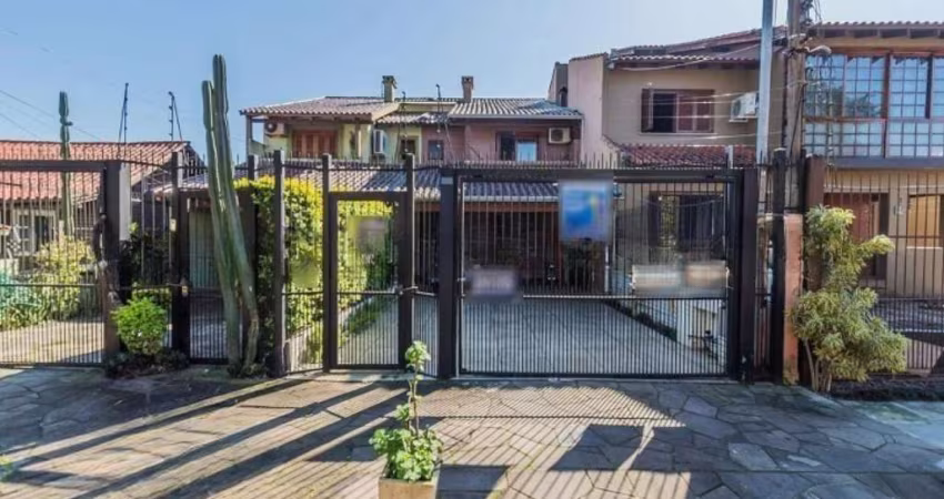 Casa com 3 quartos à venda na Rua Olécio Cavedini, 45, Espírito Santo, Porto Alegre