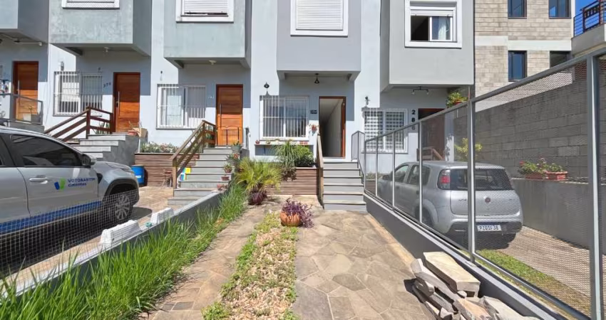 Casa com 3 quartos à venda na Rua Doutor Sérgio de Figueiredo, 284, Guarujá, Porto Alegre