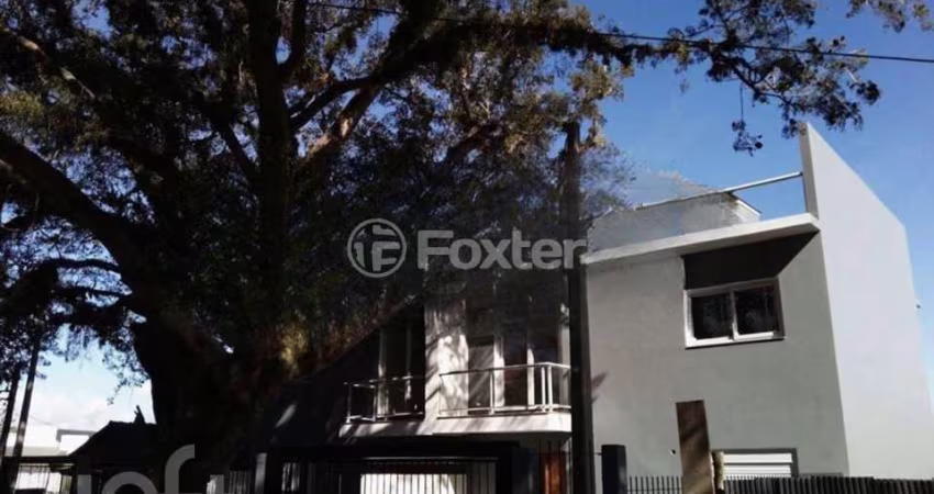 Casa com 3 quartos à venda na Rua Jacundá, 87, Guarujá, Porto Alegre