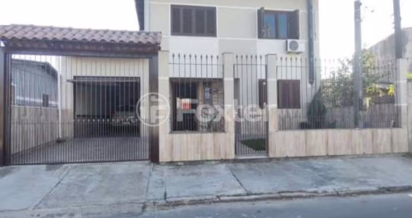 Casa com 3 quartos à venda na Rua Cascável, 605, Parque da Matriz, Cachoeirinha