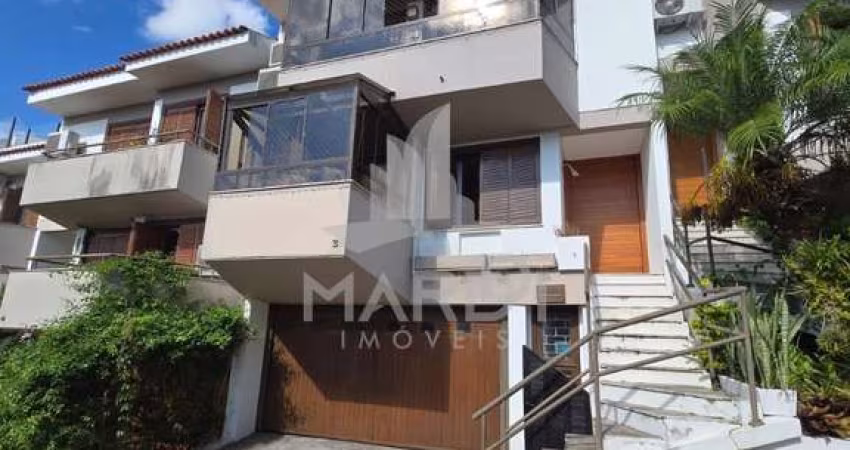 Casa em condomínio fechado com 3 quartos à venda na Avenida Jacuí, 740, Cristal, Porto Alegre