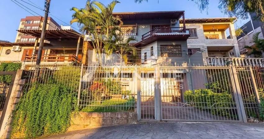 Casa com 6 quartos à venda na Rua Fernando Abbott, 1055, Cristo Redentor, Porto Alegre