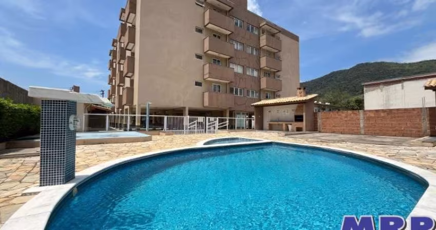 Praia da Maranduba, 2 dormitórios. Apartamento à venda. Condomínio com elevador e piscina.