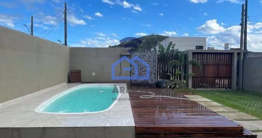 Casa com piscina à venda no bairro Cidade Jardim em Caraguatatuba, SP - Viva com conforto e comodid