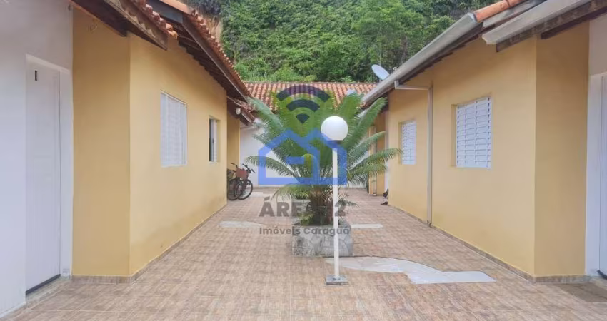 Casa com 2 dormitórios em condomínio para locação à poucos metros da praia na Martim de Sá em Carag
