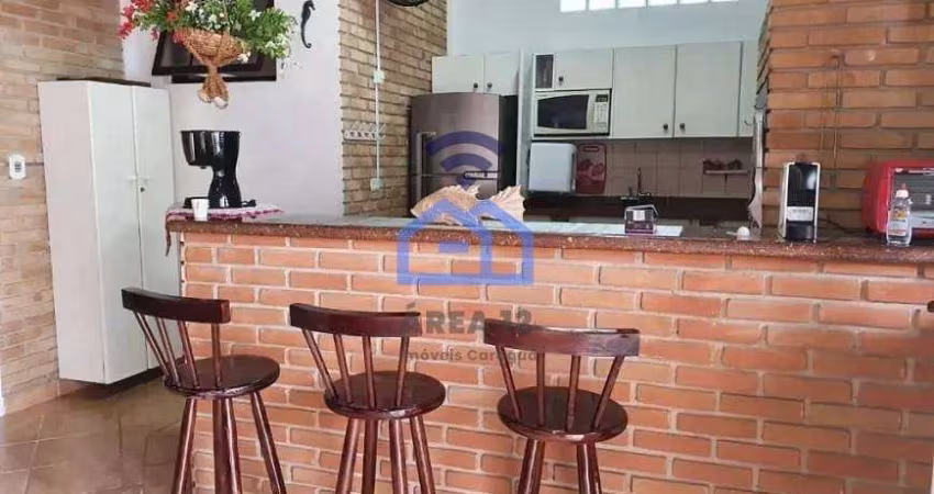 Sobrado com piscina e área gourmet à venda no bairro da Praia das Palmeiras em Caraguatatuba, SP