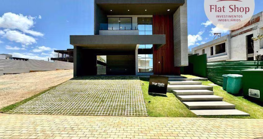 Excelente casa duplex com piscina no Alphaville Terra 1, com 4 suites e 4 vagas. Nascente