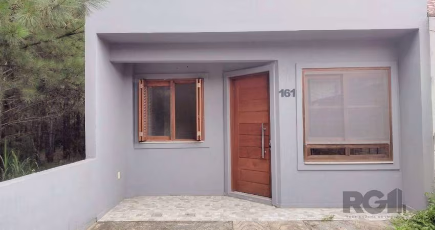 CASA TÉRREA - 2 DORMITÓRIOS, ÁREA COBERTA COM CHURRASQUEIRA , TERRAÇO - 02 VAGAS