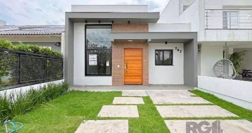 Casa em Porto Alegre, no bairro Hípica, com 3 dormitório(s), e 3 banheiros, à venda.