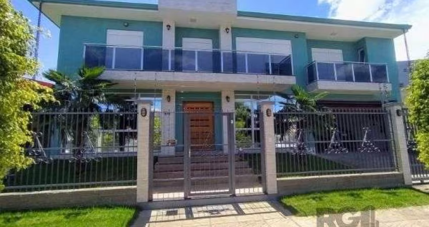 Casa em Porto Alegre, no bairro Hípica, com 3 dormitório(s), e 3 banheiros, à venda.