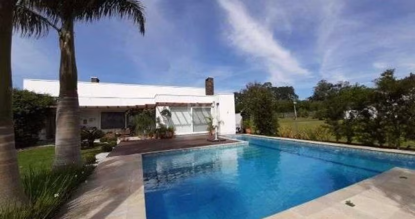 Casa Condominio em Porto Alegre, no bairro Belém Novo, com 3 dormitório(s), e 3 banheiros, à venda.