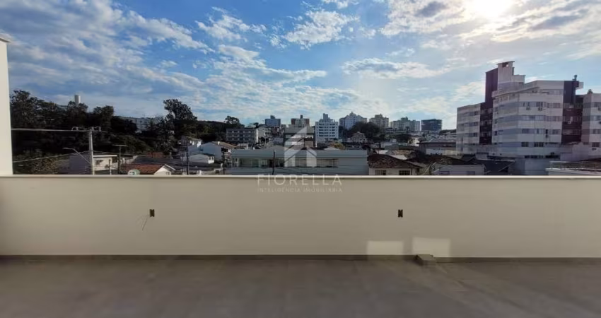 Apartamento à venda com terraço, 02 dormitórios, 01 suíte, 01 vaga, no bairro Praia Comprida/São José-SC