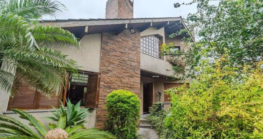 Casa 400m² - 5 dormitórios, 4 vagas no bairro Vila Jardim