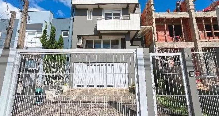 Casa em Porto Alegre, no bairro Hípica, com 3 dormitório(s), e 3 banheiros, à venda.