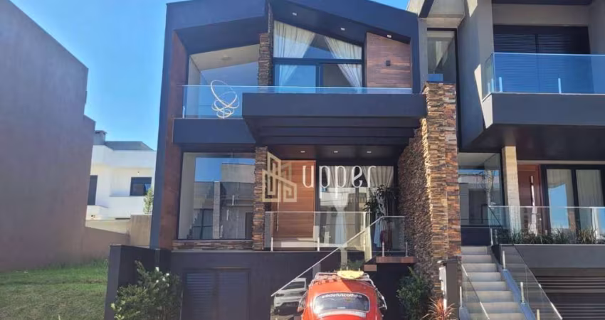 Casa com 3 dormitórios à venda, 170 m² por R$ 1.200.000 - Condomínio Primavera - Gravataí/RS