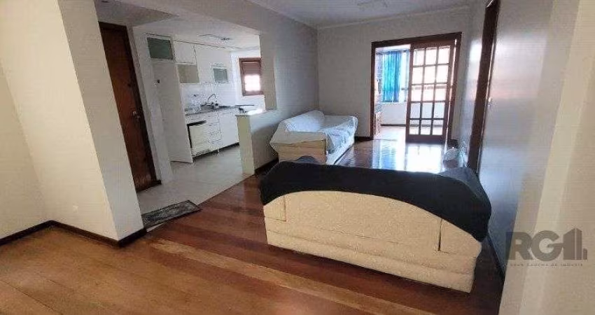 Apartamento de 2 dormitórios grande com suite, sacada fechada com churrasqueira,