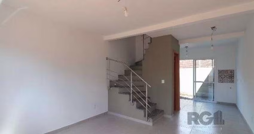 Casa Condominio em Porto Alegre, no bairro Vila Nova, com 2 dormitório(s), e 2 b