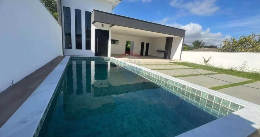 Casa em condomínio três quartos uma suíte e piscina.