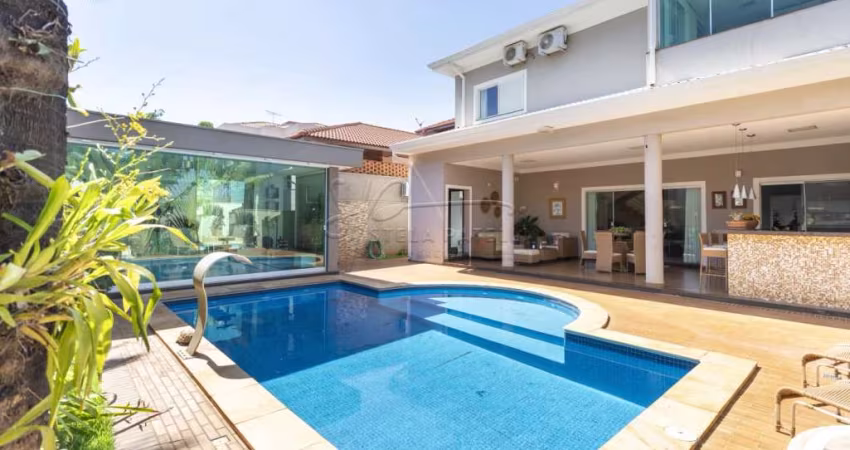 Casa sobrado de 373m² com 04 suítes à venda em condomínio - Guaporé