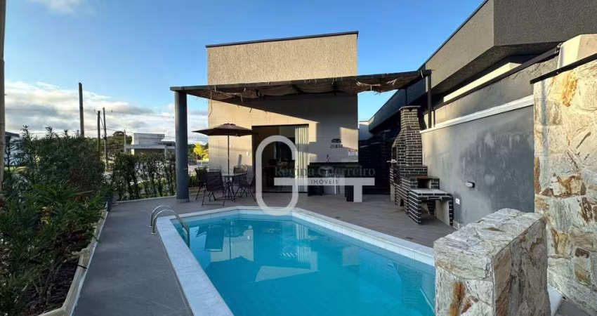 Casa com 3 dormitórios à venda, 170 m² por R$ 990.000,00 - Residencial Bosque Três Marias  - Peruíbe/SP