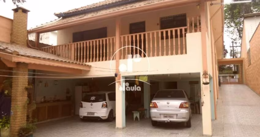 Casa térrea com 4 Dormitórios, sendo 1 Suíte e 8 Vagas de Garagem no Bairro Jardim Bela Vista - Santo André/SP. Aceita permuta.