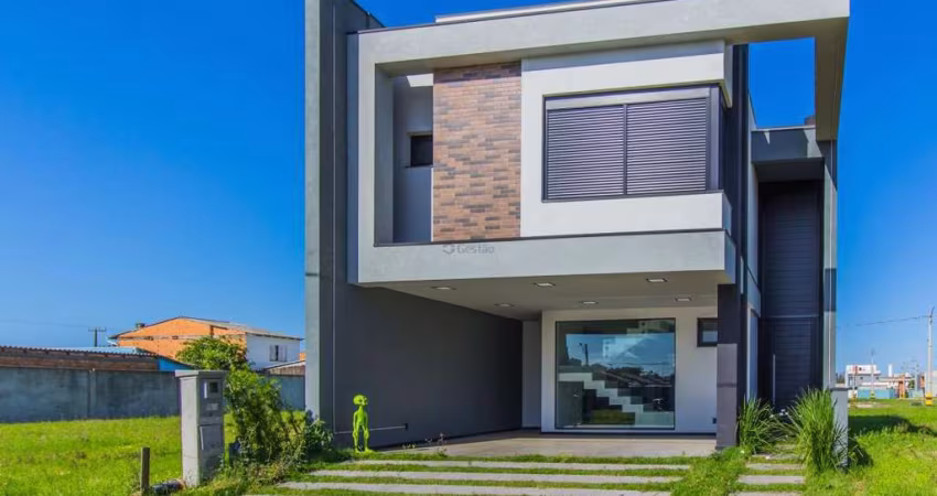 vende sobrado novo em condomínio com 3 suítes em Canoas.