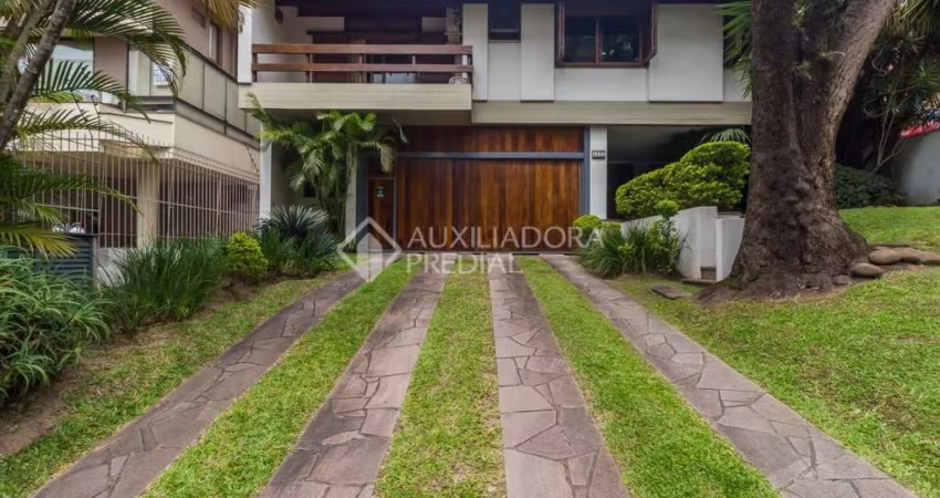 Casa em condomínio fechado com 4 quartos à venda na Rua Carlos Trein Filho, 1255, Auxiliadora, Porto Alegre