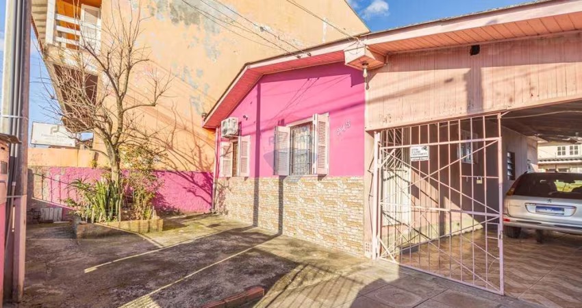 Terreno 10x30  com 2 casas no pátio à venda,  por R$425.000 - Bairro Monte Carlo- Cachoeirinha/RS