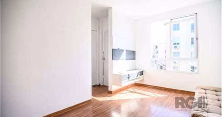 Apartamento à venda localizado na Rua Ney da Gama Ahrends, no bairro Morro Santana em Porto Alegre. Este imóvel conta com área privativa de 43m², mobiliado, split, oferecendo 2 quartos, sala com cozin