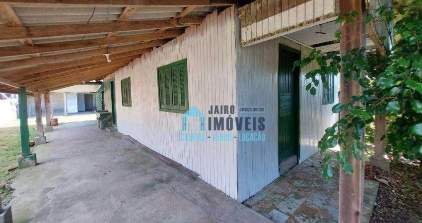Terreno com 2 casas, uma em alvenaria e uma em madeira, à venda por R$ 110.000 - Balneario Pinhal - Balneário Pinhal/RS