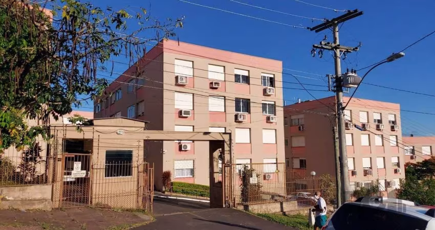 Apartamento de dois dormitórios com uma vaga de garagem no bairro Cristal em Porto Alegre.