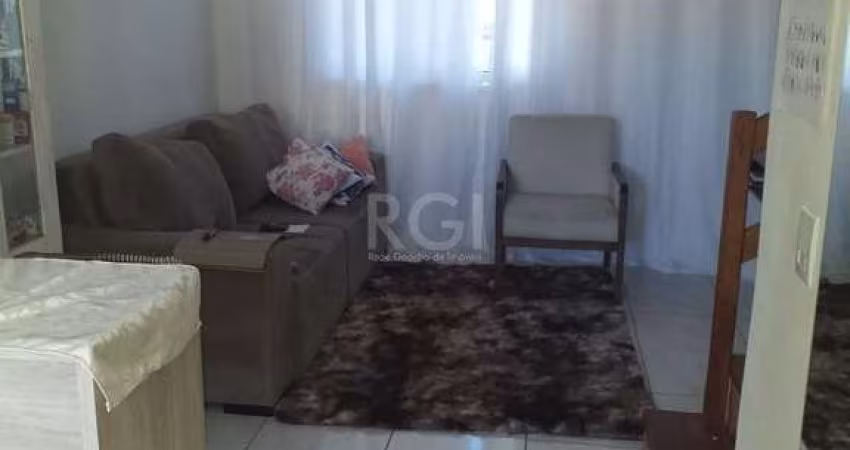 Casa com 2 quartos, banheiro, área de serviço, cozinha, vaga de garagem, no bairro Aberta dos Morros/RS