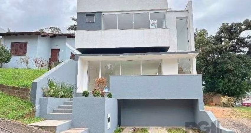 Casa Condominio em Porto Alegre, no bairro Hípica, com 3 dormitório(s), à venda.
