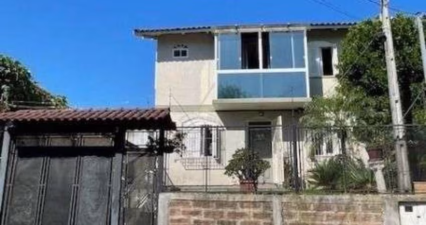 Casa em Porto Alegre, no bairro Vila Nova, com 3 dormitório(s), e 3 banheiros, à venda.