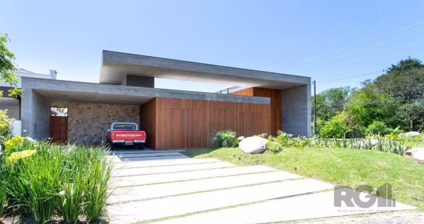 A Casa Le Mans, uma residência térrea de esquina com 389,48m2 de área coberta