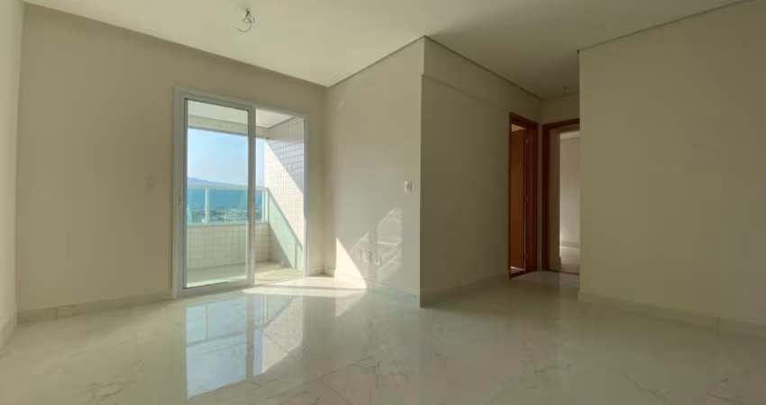 Apartamento com 2 dormitórios à venda, 70 m² por R$ 520.000,00 - Caiçara - Praia Grande/SP