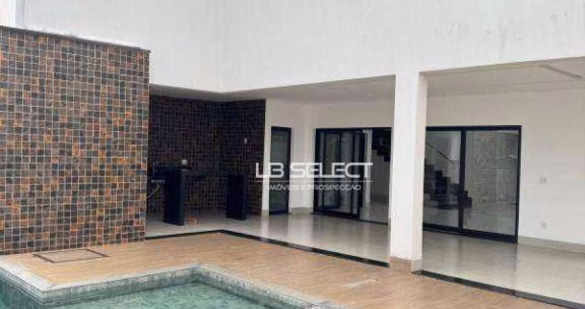 Casa no Condomínio Gávea Hill II com quatro suítes e área gourmet completa.