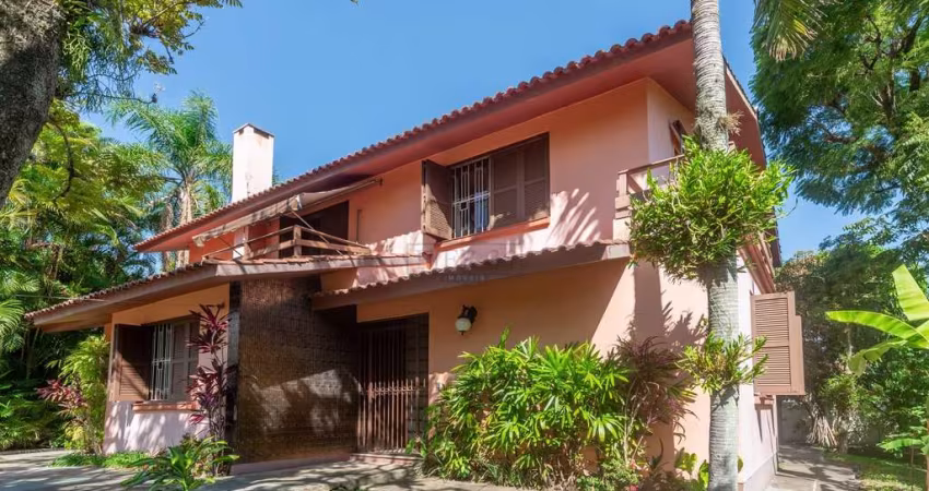 Casa com 5 quartos à venda na Rua Itapitocaí, 725, Cristal, Porto Alegre