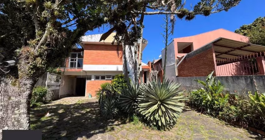 Casa 3 dormitórios à venda Guarujá Porto Alegre/RS