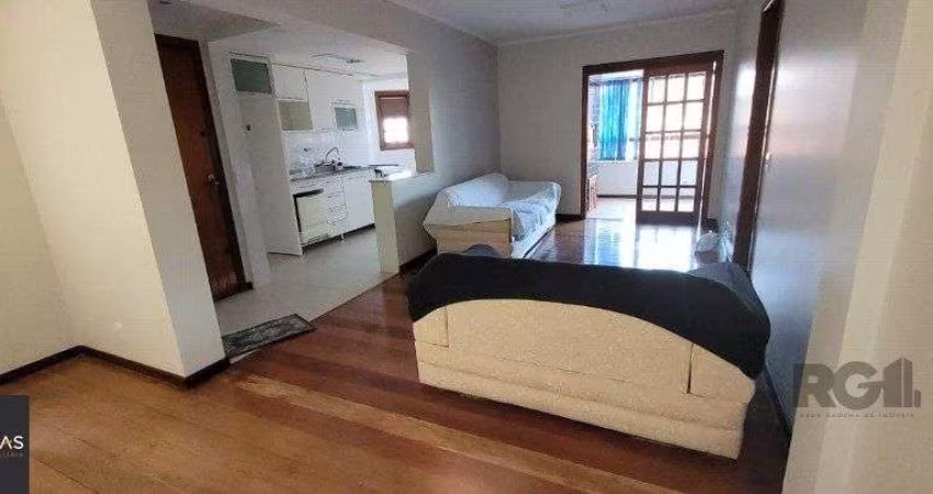 Apartamento de 2 dormitórios grande com suite, sacada fechada com churrasqueira,