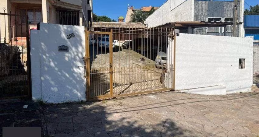 Terreno de 392m² com casa mista de 82m²