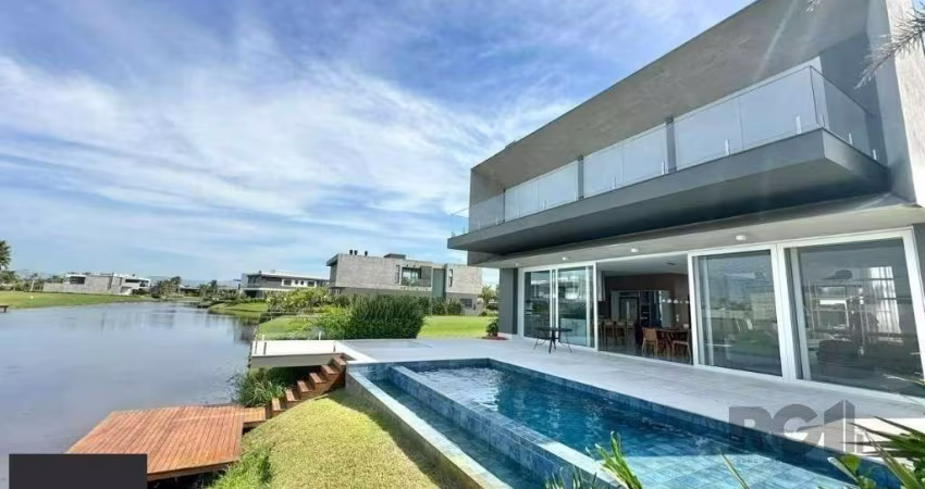 Sobrado Beira Lago com piscina e Deck com 457m² e 5 suítes no Condomínio Sense e